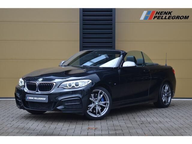 Zwart, metallic lak Gebruikt 2015 BMW M235 M Sport Cabriolet | € 23.950 (Eerlijke prijs) - Afbeelding 1/4