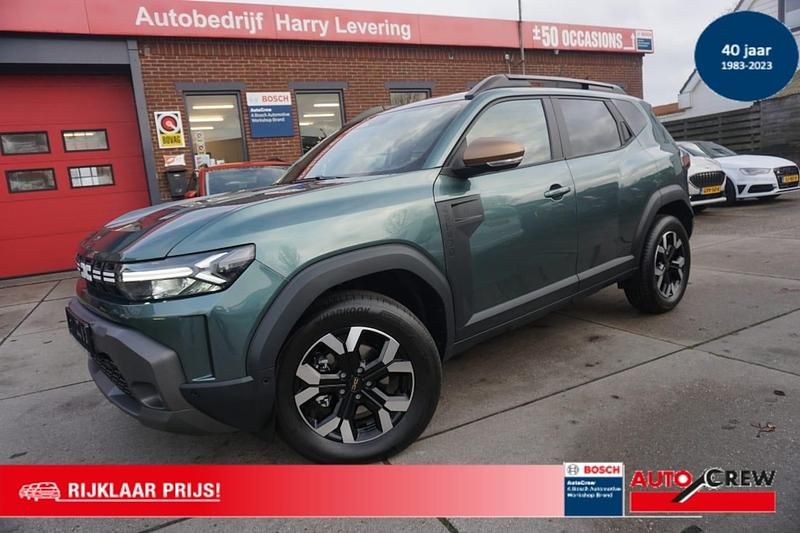 Groen (metallic) Gebruikt 2025 Dacia Duster Extreme SUV | € 30.950 - Afbeelding 1/4
