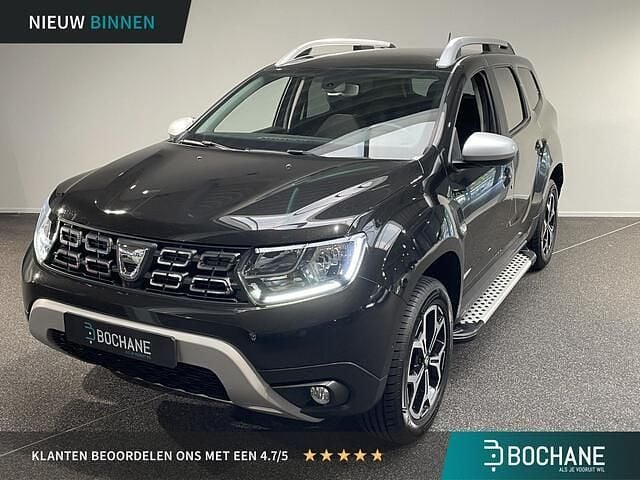 Zwart nacre 676 Gebruikt 2018 Dacia Duster Prestige SUV | € 15.400 (Iets duurder) - Afbeelding 1/4