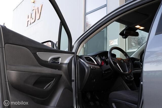 Grijs Gebruikt 2013 Opel Mokka Cosmo SUV | € 10.950 (Eerlijke prijs) - Afbeelding 1/4