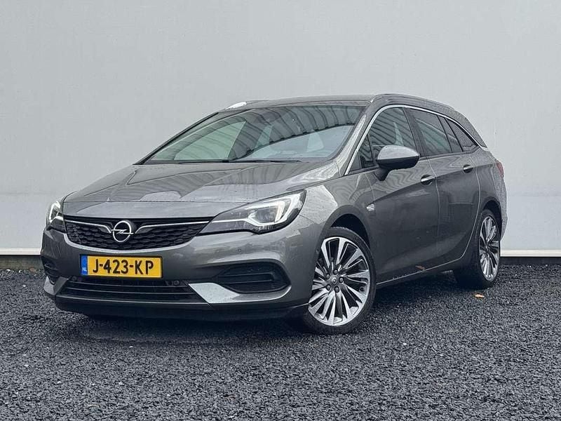 Grijs Gebruikt 2020 Opel Astra Comfort Stationwagen | € 12.350 (Goede deal) - Afbeelding 1/4