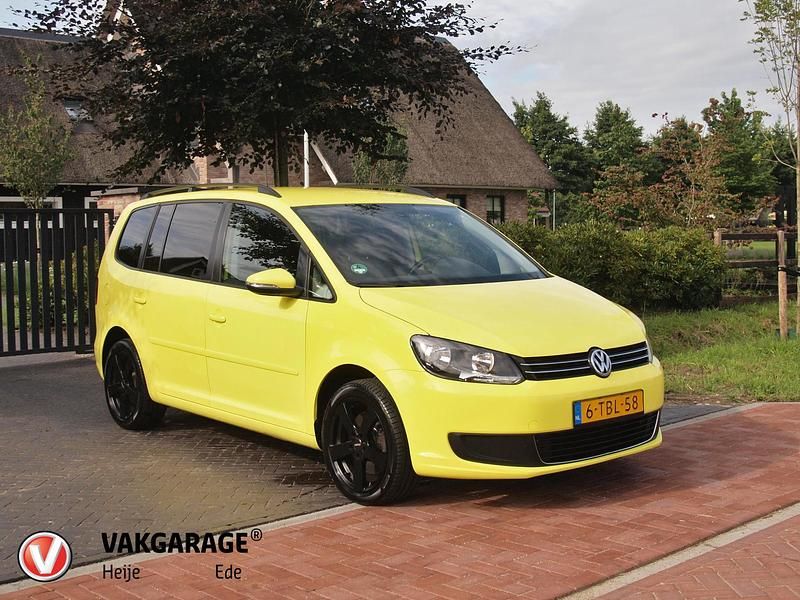 Geel Occasion 2014 VW Touran Comfortline MPV | € 6.490 - Afbeelding 1/4