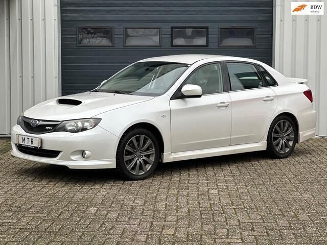 Wit Occasion 2009 Subaru Impreza Hatchback | € 18.950 - Afbeelding 1/2