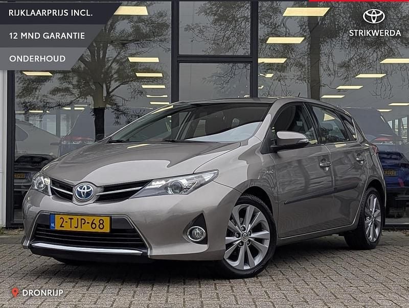 Bruin Gebruikt 2014 Toyota Auris Hybrid Hatchback | € 10.495 (Eerlijke prijs) - Afbeelding 1/4