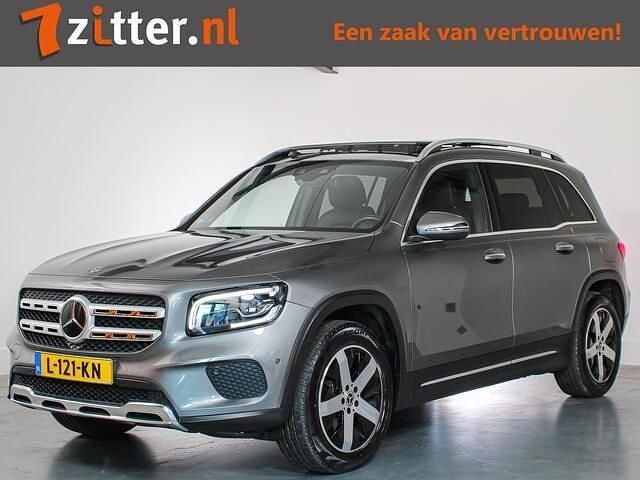 Grijs Gebruikt 2021 Mercedes GLB180 Luxury SUV | € 37.395 (Goede deal) - Afbeelding 1/4