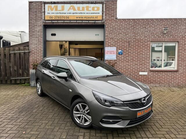 Grijs Gebruikt 2020 Opel Astra Edition Stationwagen | € 11.995 (Goede deal) - Afbeelding 1/4