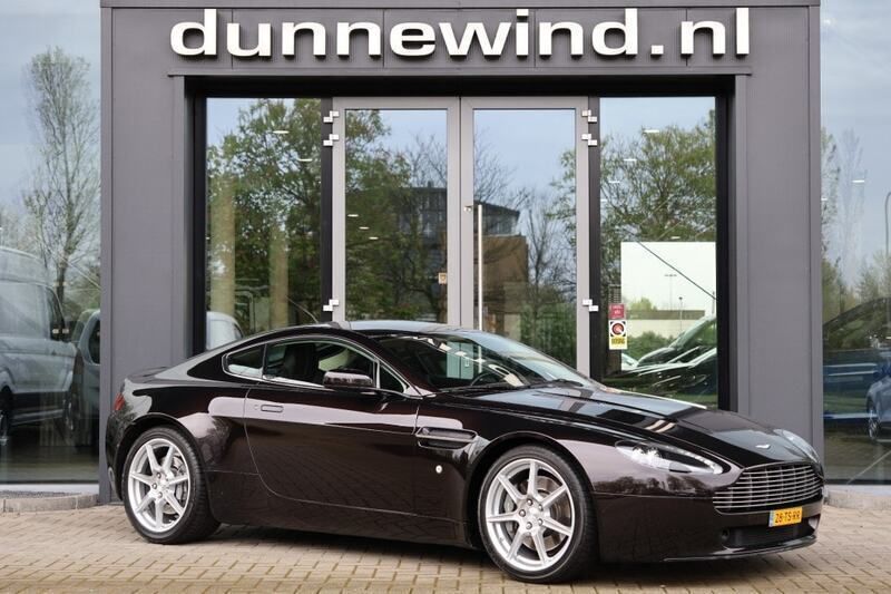 Bruin, metallic lak Gebruikt 2007 Aston Martin V8 Vantage Coupé | € 49.950 (Goede deal) - Afbeelding 1/4