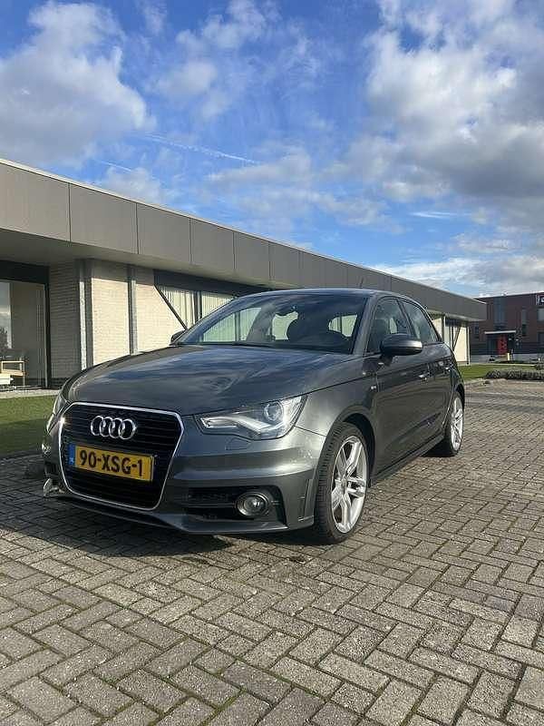 Grijs Gebruikt 2012 Audi A1 S-Line Hatchback | € 8.995 (Goede deal) - Afbeelding 1/4