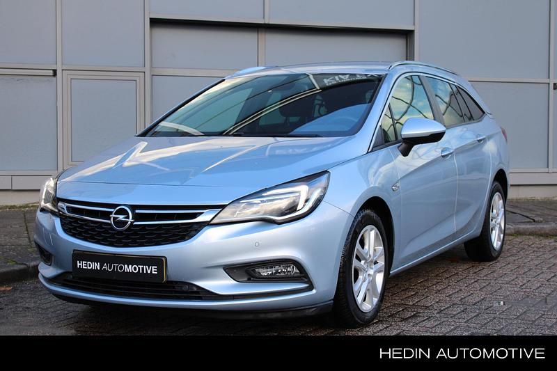 Grijs Gebruikt 2018 Opel Astra Edition Stationwagen | € 14.745 (Eerlijke prijs) - Afbeelding 1/4
