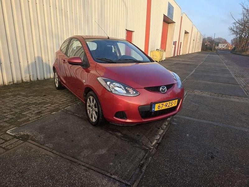 Rood Occasion 2008 Mazda 2 Exclusive Hatchback | € 1.595 (Eerlijke prijs) - Afbeelding 1/4