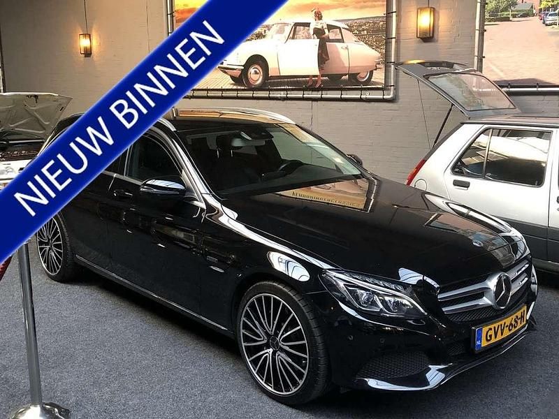 Zwart (metallic) Occasion 2018 Mercedes C350e Sport Edition Stationwagen | € 19.900 (Eerlijke prijs) - Afbeelding 1/4