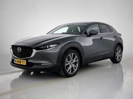 Grijs, metallic lak Gebruikt 2021 Mazda CX-30 Luxury SUV | € 25.695 (Eerlijke prijs) - Afbeelding 1/3