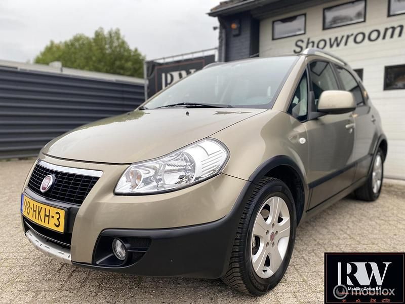 Beige Gebruikt 2009 Fiat Sedici Emotion SUV | € 4.495 (Eerlijke prijs) - Afbeelding 1/4
