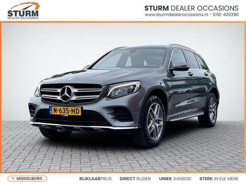 Grijsberggrijs Gebruikt 2017 Mercedes GLC350 AMG line SUV | € 27.895 (Super prijs) - Afbeelding 1/4