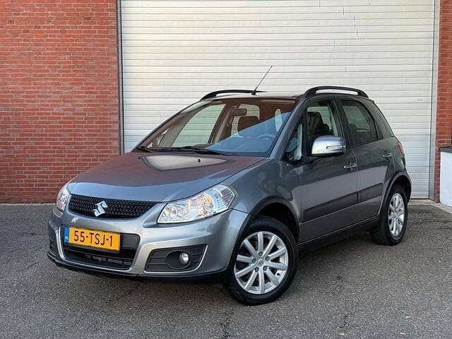 Grijs Gebruikt 2012 Suzuki SX4 MPV | € 6.299 (Goede deal) - Afbeelding 1/4