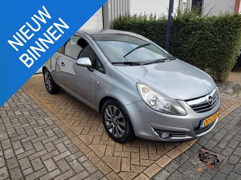 Grijs Gebruikt 2010 Opel Corsa Edition Hatchback | € 1.750 (Super prijs) - Afbeelding 1/4