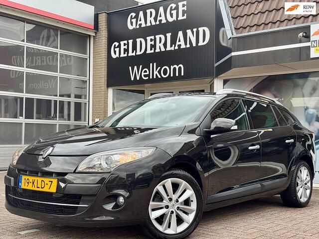 Zwart Gebruikt 2010 Renault Mégane GrandTour Stationwagen | € 3.700 - Afbeelding 1/4