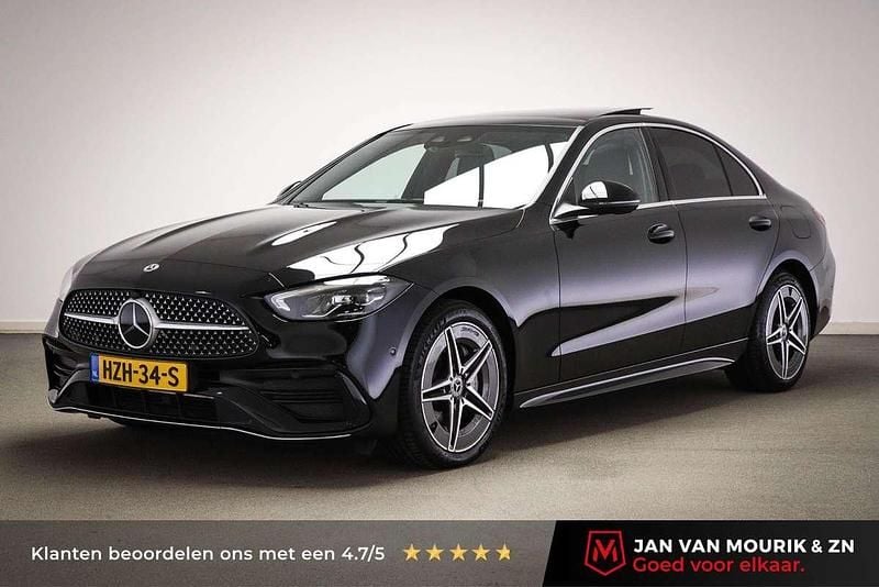 Zwart, metallic lak Gebruikt 2023 Mercedes C300e AMG line Sedan | € 45.900 (Eerlijke prijs) - Afbeelding 1/4