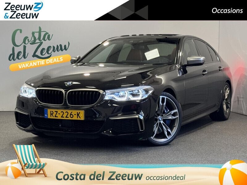 Almandinebraun metallic (bruin metallic) Gebruikt 2018 BMW M550 Executive Sedan | € 54.440 (Duur) - Afbeelding 1/4