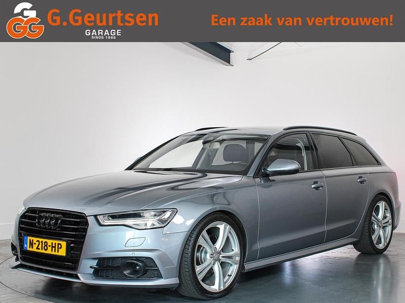 Grijs (metallic) Occasion 2017 Audi A6 S-Line Stationwagen | € 20.495 (Eerlijke prijs) - Afbeelding 1/4