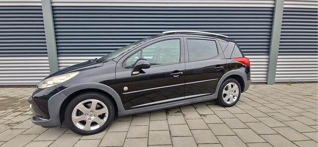 Zwart (metallic) Occasion 2009 Peugeot 207 Outdoor Outdoor Stationwagen | € 2.999 (Iets duurder) - Afbeelding 1/4