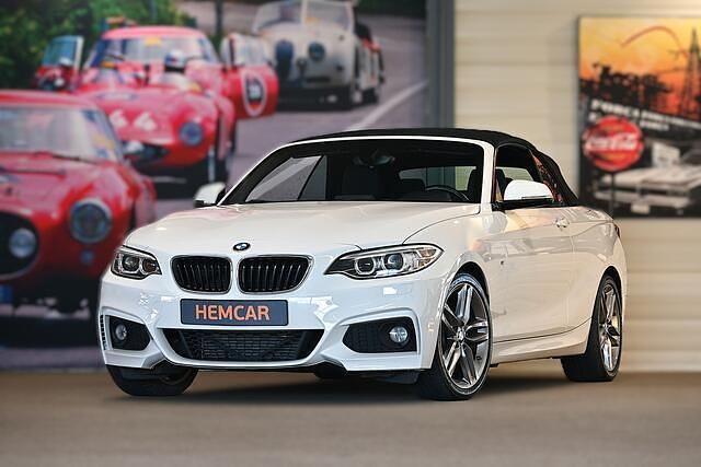 Wit Occasion 2015 BMW 218 Luxury Line Cabriolet | € 16.950 (Goede deal) - Afbeelding 1/4