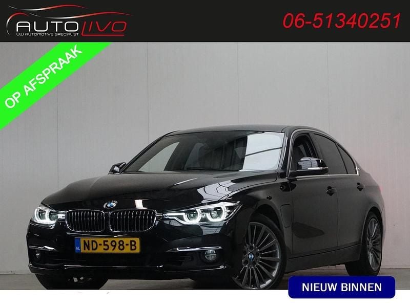 Zwart Gebruikt 2016 BMW 330e Executive Sedan | € 21.795 (Eerlijke prijs) - Afbeelding 1/4