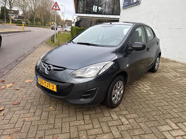 Grijs Gebruikt 2012 Mazda 2 Hatchback | € 3.499 (Eerlijke prijs) - Afbeelding 1/4