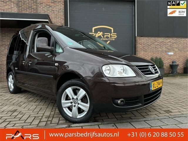 Paars, metallic lak Gebruikt 2010 VW Caddy Comfortline MPV | € 5.950 (Iets duurder) - Afbeelding 1/4
