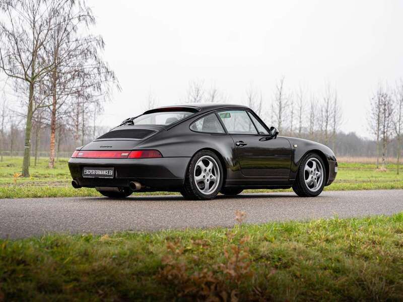 Grijs, metallic lak Gebruikt 1995 Porsche 911 Coupé | € 127.993 - Afbeelding 1/4