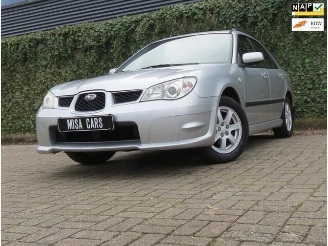 Grijs Gebruikt 2009 Subaru Impreza Comfort Hatchback | € 7.399 (Duur) - Afbeelding 1/4