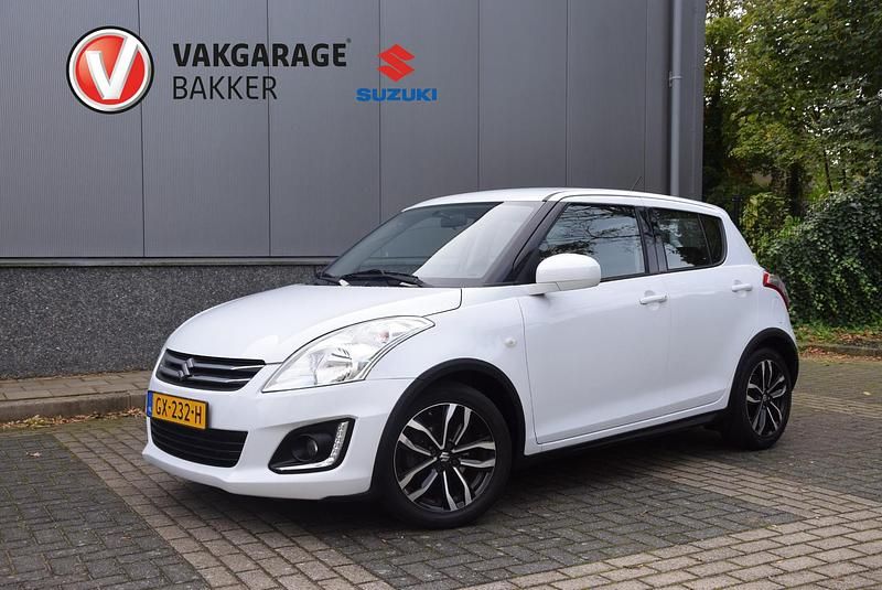 Wit Gebruikt 2015 Suzuki Swift Style Hatchback | € 10.500 (Eerlijke prijs) - Afbeelding 1/4
