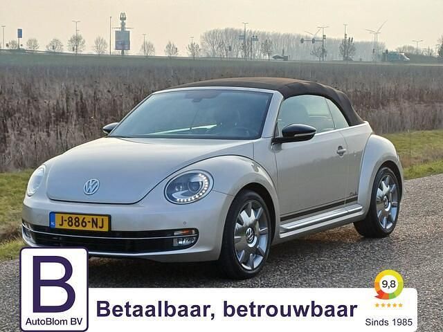 Grijs (metallic) Occasion 2015 VW Beetle CLUB Cabriolet | € 19.995 (Eerlijke prijs) - Afbeelding 1/4