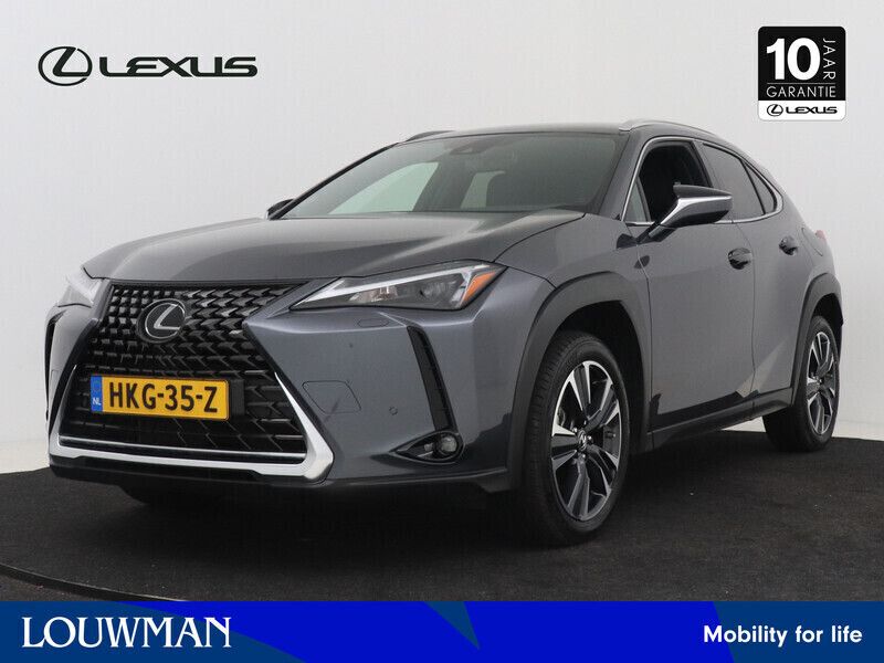 Grijs, metallic lak Gebruikt 2024 Lexus UX Business Edition SUV | € 43.945 (Eerlijke prijs) - Afbeelding 1/4