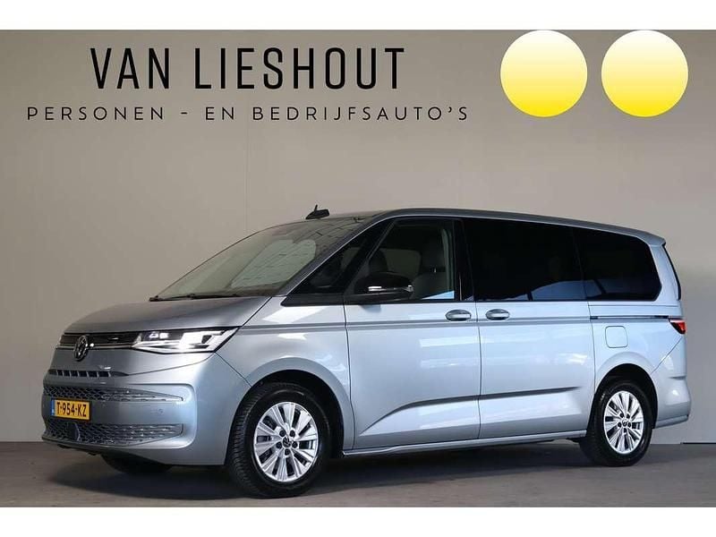 Grijs Gebruikt 2023 VW Multivan Style Van | € 53.700 (Eerlijke prijs) - Afbeelding 1/4