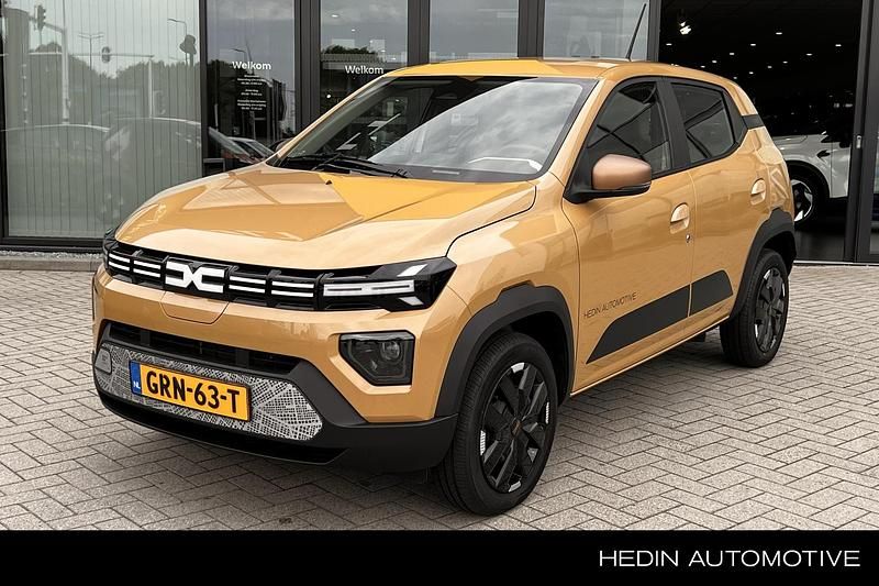 Bruin Gebruikt 2024 Dacia Spring Extreme Hatchback | € 15.950 (Eerlijke prijs) - Afbeelding 1/4
