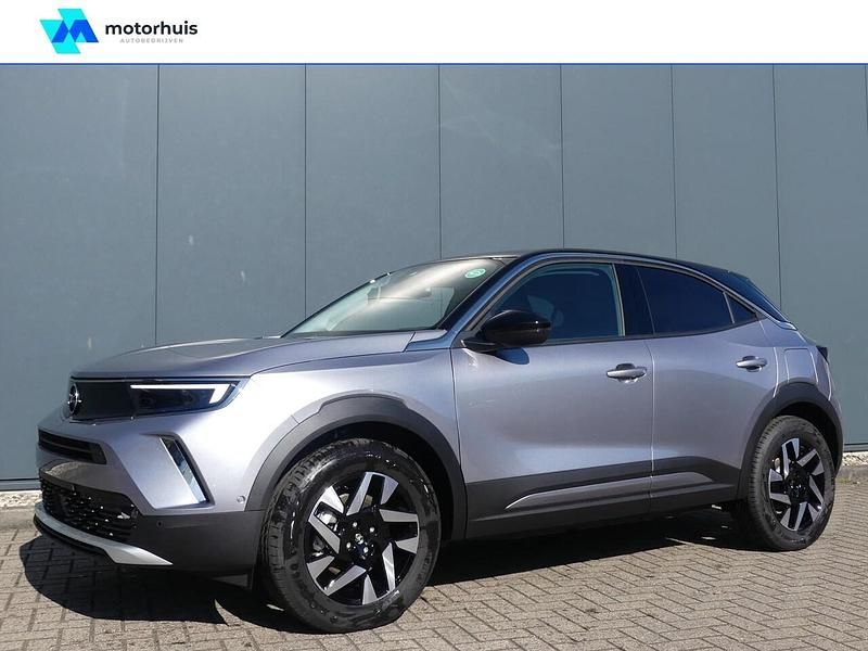 Grijs (metallic) Occasion 2023 Opel Mokka-e Elegance SUV | € 19.945 (Eerlijke prijs) - Afbeelding 1/4