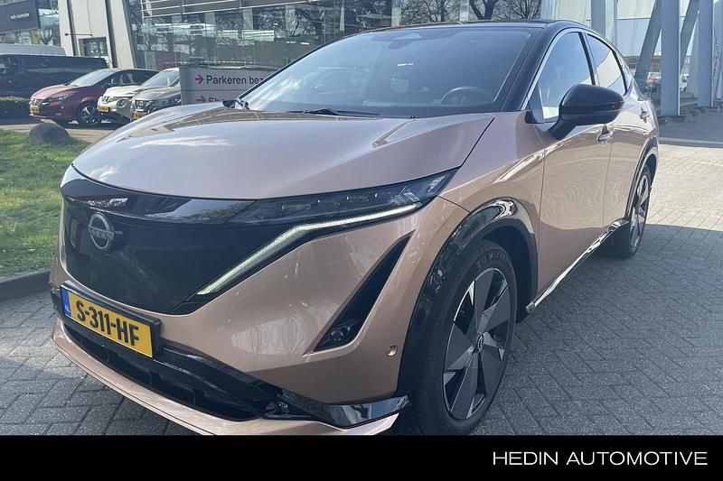 Bruin Gebruikt 2023 Nissan Ariya Evolve SUV | € 33.790 (Eerlijke prijs) - Afbeelding 1/4
