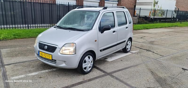 Grijs Gebruikt 2000 Suzuki Wagon R+ GL Stationwagen | € 999 (Goede deal) - Afbeelding 1/4