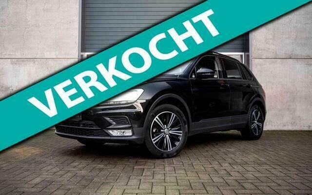 Zwart Gebruikt 2016 VW Tiguan Trendline SUV | € 24.950 (Eerlijke prijs) - Afbeelding 1/4