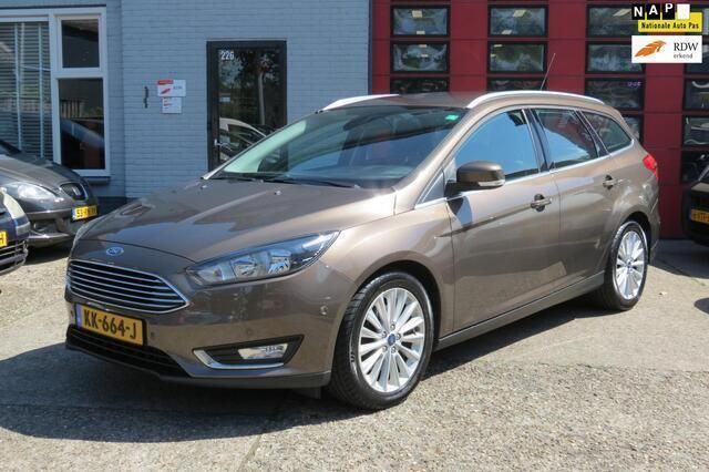Bruin Gebruikt 2016 Ford Focus Titanium Stationwagen | € 6.950 (Goede deal) - Afbeelding 1/4