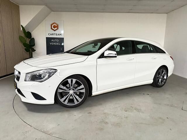 Wit Occasion 2016 Mercedes CLA180 Shooting Brake OrangeArt Edition Stationwagen | € 16.950 - Afbeelding 1/4