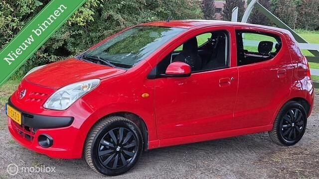 Rood Gebruikt 2011 Nissan Pixo Acenta Hatchback | € 1.999 (Eerlijke prijs) - Afbeelding 1/4