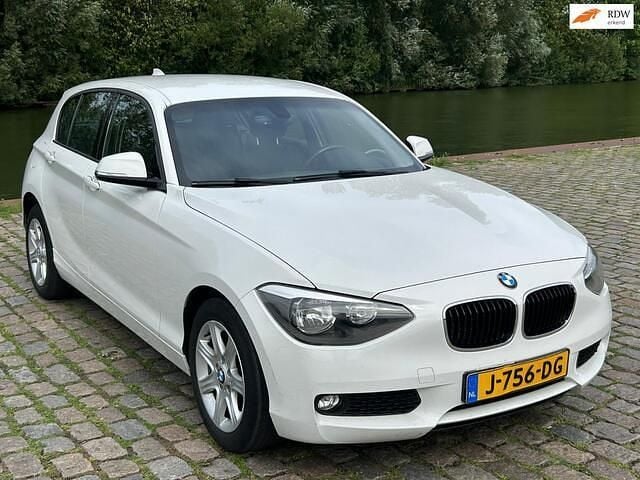 Wit Occasion 2013 BMW 114 Hatchback | € 6.999 (Goede deal) - Afbeelding 1/4