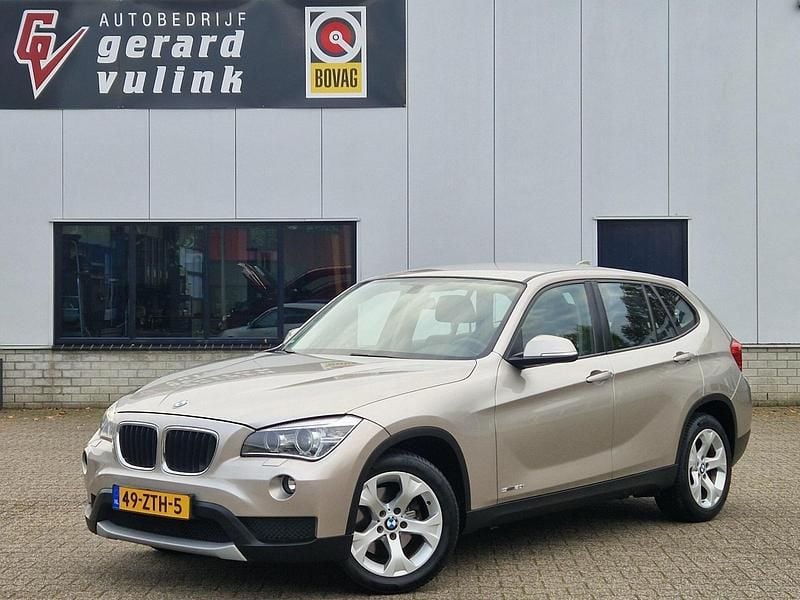 Grijs Gebruikt 2013 BMW X1 SUV | € 9.950 (Goede deal) - Afbeelding 1/4