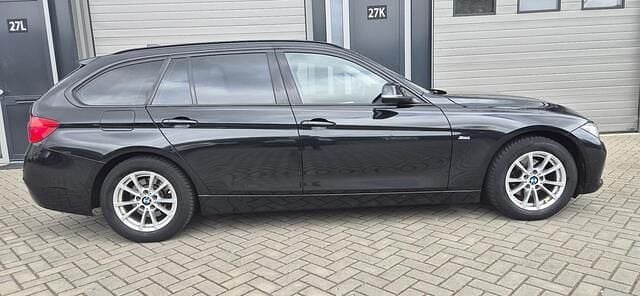 Occasion BMW 318 Sport Line 150 PK (110 kW) 2016 Zwart Stationwagen