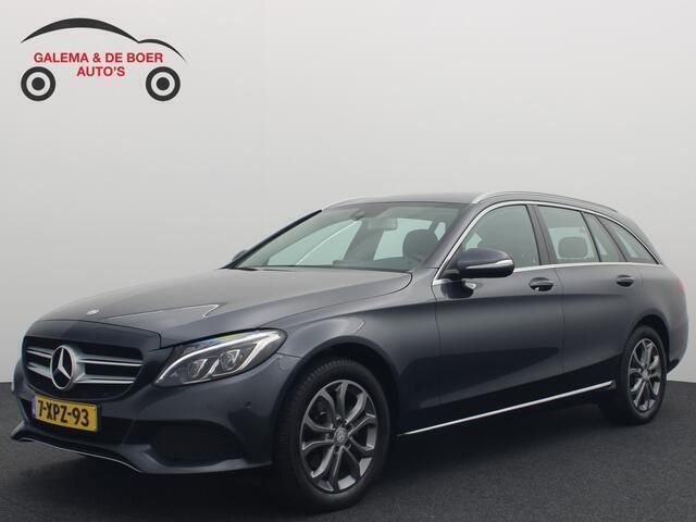 Grijs, metallic lak Gebruikt 2014 Mercedes C180 Ambition Stationwagen | € 17.888 (Eerlijke prijs) - Afbeelding 1/4