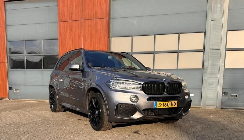 Grijs (metallic) Occasion 2018 BMW X5 iPerformance SUV | € 29.990 - Afbeelding 1/4