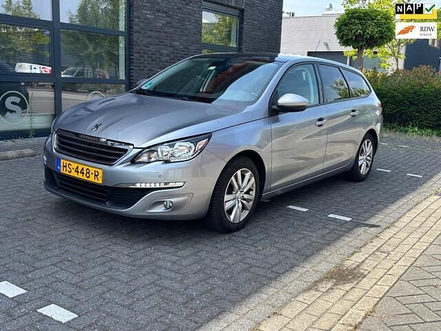 Grijs Gebruikt 2015 Peugeot 308 Stationwagen | € 5.950 (Eerlijke prijs) - Afbeelding 1/4
