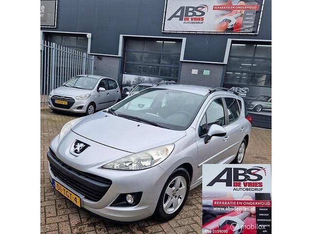 Grijs Gebruikt 2012 Peugeot 207 Stationwagen | € 3.499 (Goede deal) - Afbeelding 1/4